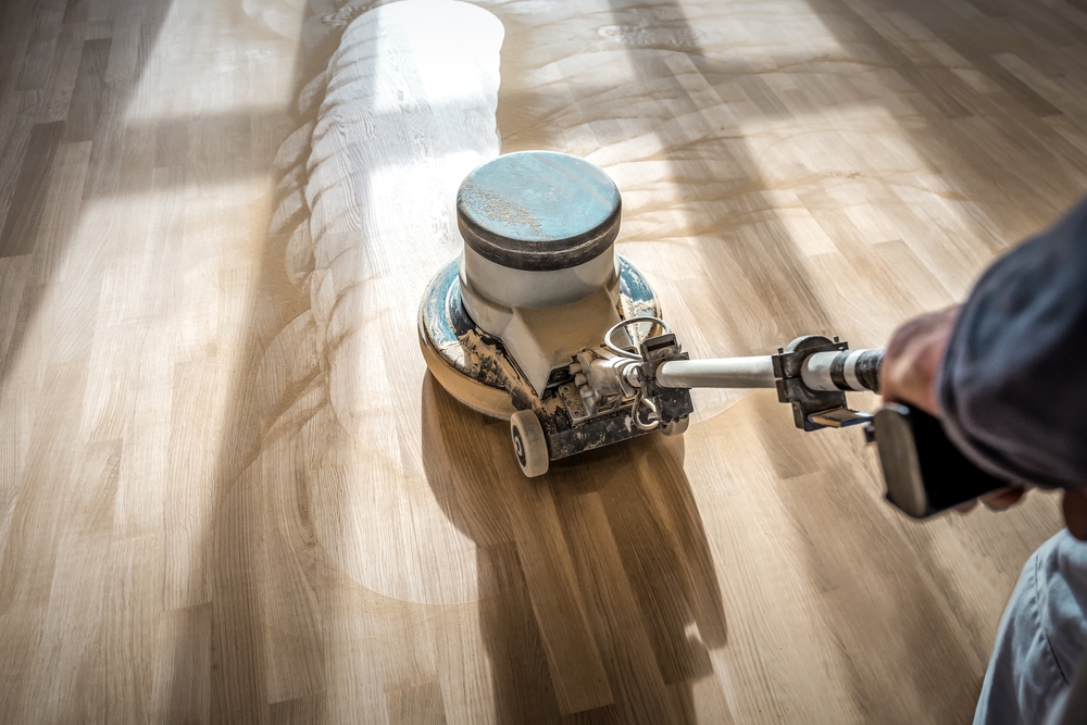Is it better to refinish hardwood floors or replace them